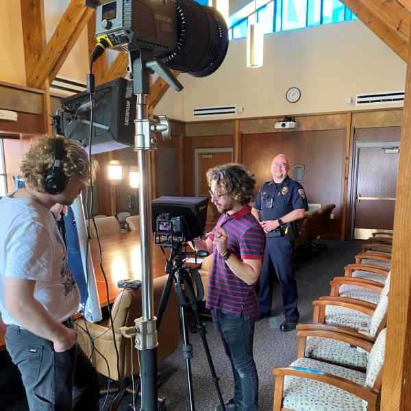 CUPD Deputy Chief Mark Heyart prepares to appear in a training video on lethality assessment.