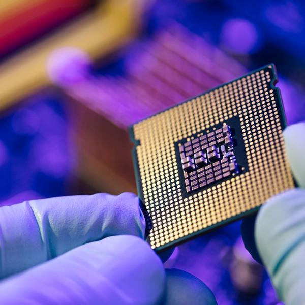 Researcher holds a chip