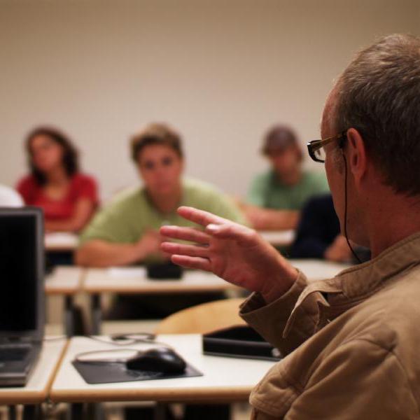 A professor lecturing a class