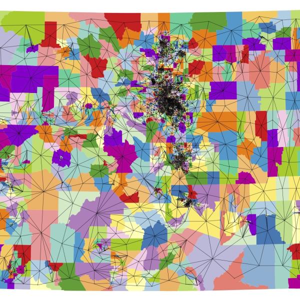 Graphic that pinpoints the hundreds of voting districts in the state, then connects them with lines to form borders.