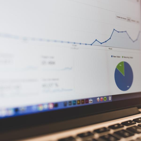 Computer with charts and graphs