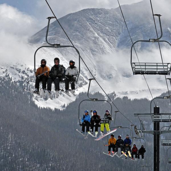 skiers on a ski life