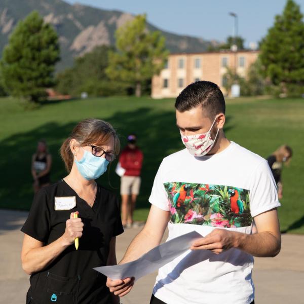 Campus community members wearing masks
