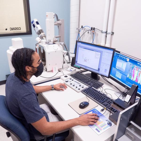 Jared Lewis working in the COSINC facility (Photo provided)