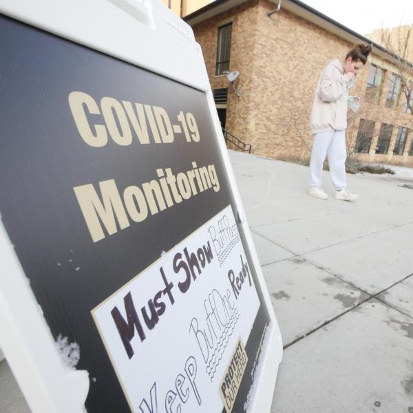 Mia Gallay, a psychology major from Chicago, takes a COVID-19 test at Williams Village at CU Boulder. (Photo by Casey A. Cass/University of Colorado)