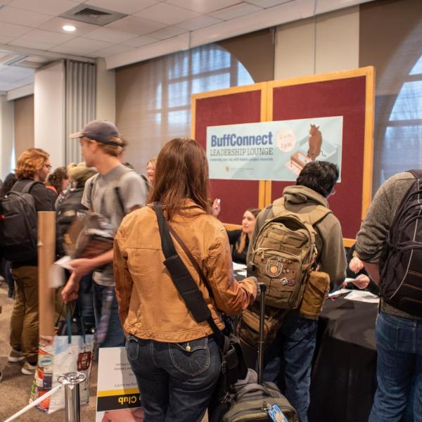 Students visit booths at the spring Involvement Fair