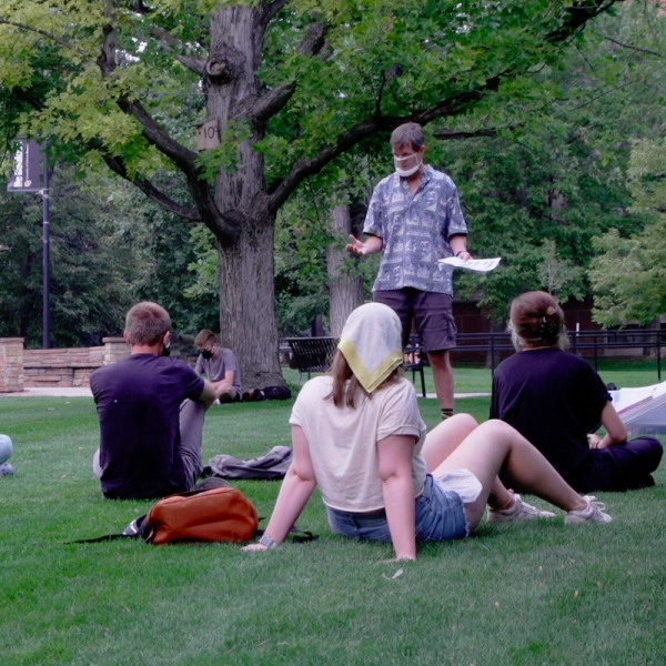 A CU Teach class meets outdoors