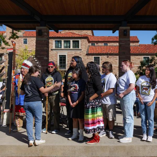 Campus community members participate in the campus powwow