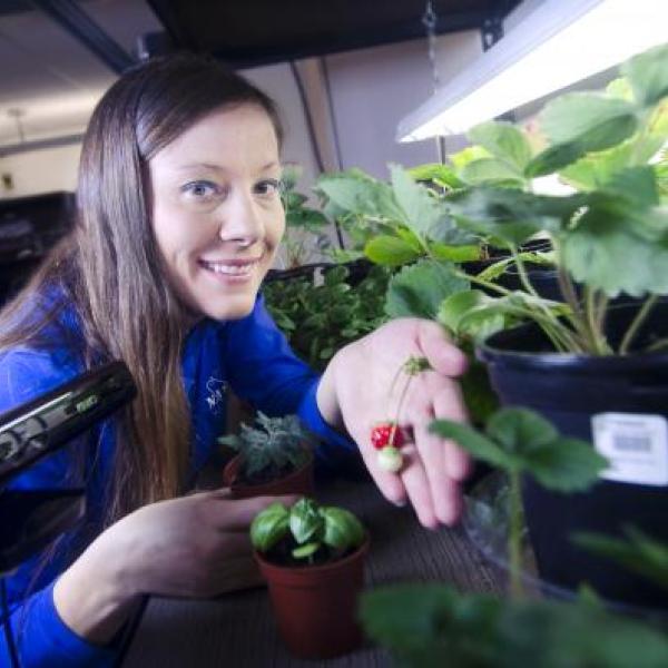 student gardening