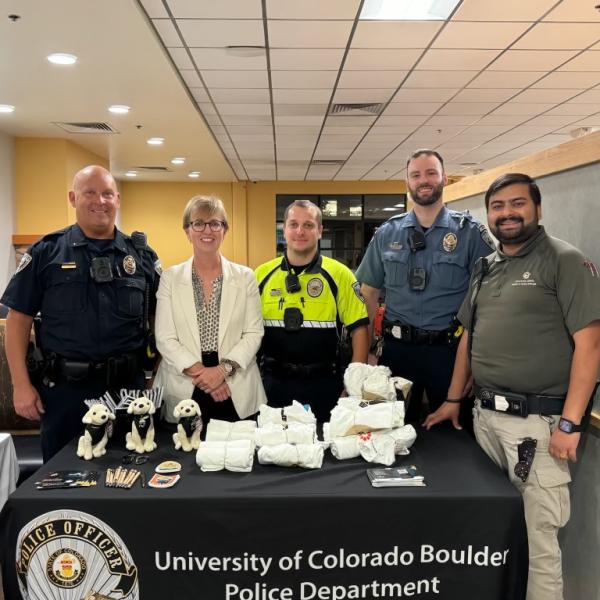 CUPD and the CSPV tabling at a Fall Welcome 2024 event