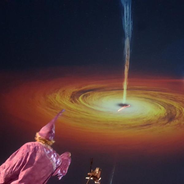Professor Andrew Hamilton teaches about black holes while wearing a wizard costume
