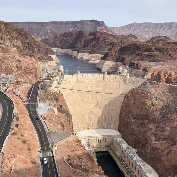 A dam surrounded by rocky terrain