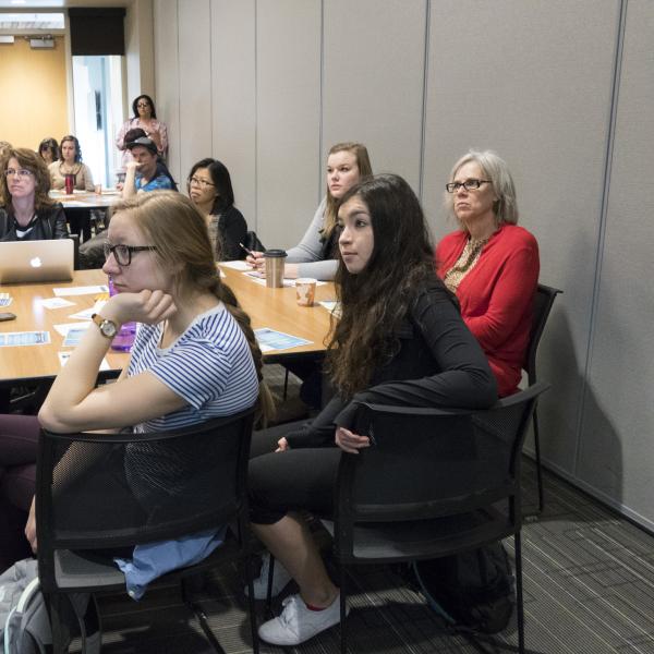 Participants at the 2015 Diversity & Inclusion Summit sit around a table