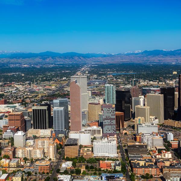 Denver skyline with Rocky Mountains in the background