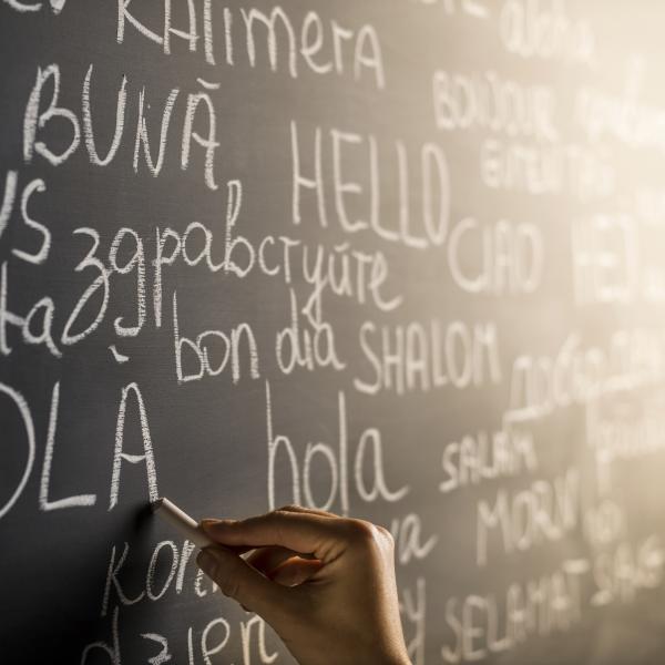 Child's hand with chalkboard