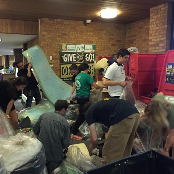 Volunteers work during move-out donation drive