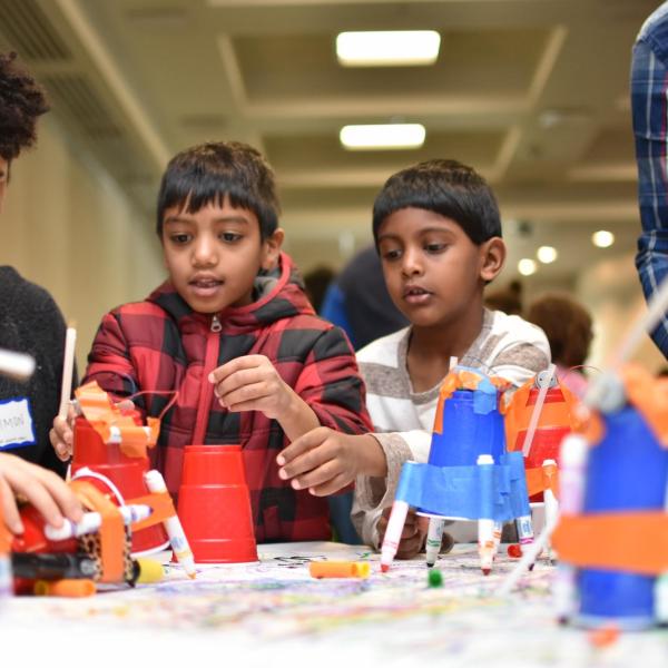 People learning at an engineering event