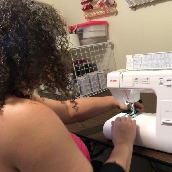 Levinson sewing a horn cover