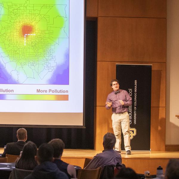 Graduate student presenting during the Three Minute Thesis competition