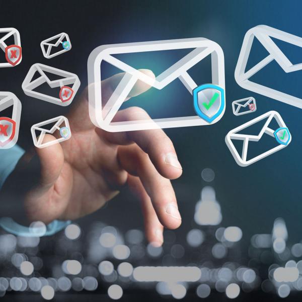 person selecting an email icon