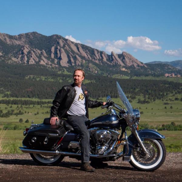 Erick Mueller, executive director of the Deming Center for Entrepreneurship, on his motorcycle.