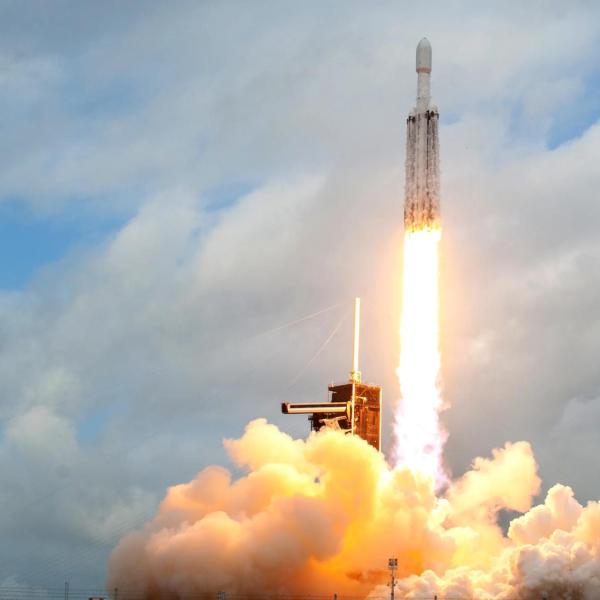 Photo of rocket blasting off from a launch pad