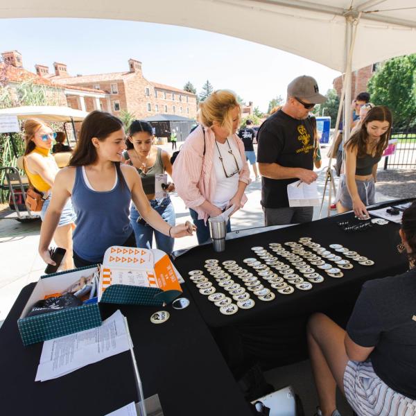 Volunteers help students and families during move-in