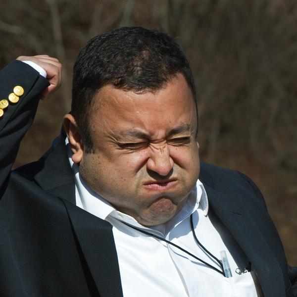 A television reporter reacts to being hit by a heat ray during a demonstration of the U.S. military’s Active Denial System.