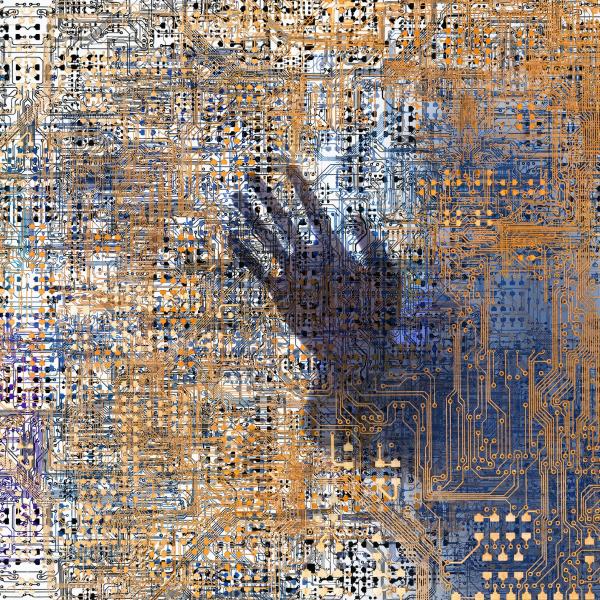 The outline of a human hand trapped behind a grid of tiny intersecting circuits