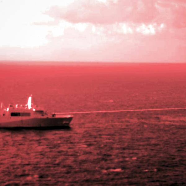 The USS Portland test-fires a laser weapon