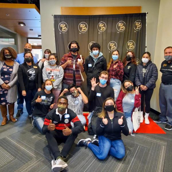 Group of first-generation students pose for photos