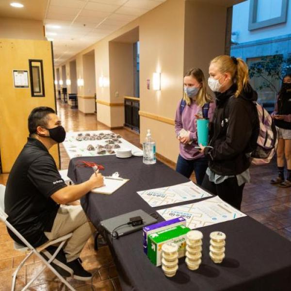 Students chatting at a table
