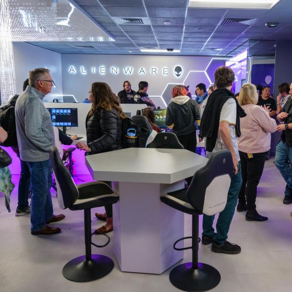 Campus community members mingling at the grand opening of the new UMC Gaming Lounge