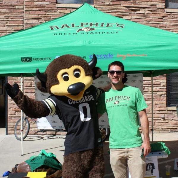 Chip the Buffalo with a Green Stampede volunteer