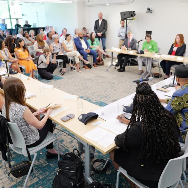 Panelists and attendees discuss gun violence prevention.