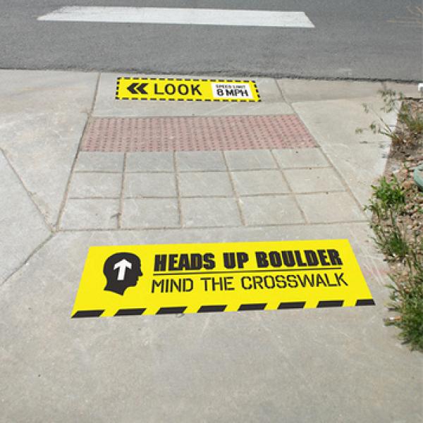 Heads Up Boulder crosswalk safety campaign sign