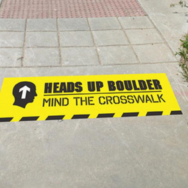 Heads Up Boulder crosswalk safety campaign sign