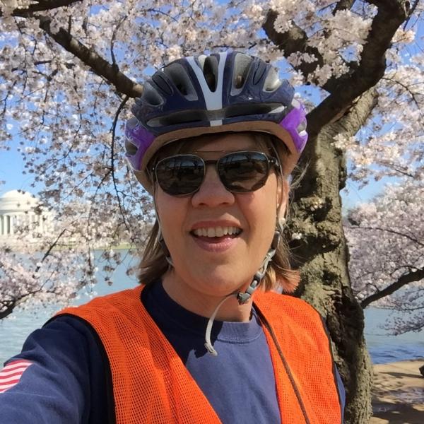 Heidi VanGenderen with cherry blossoms, Thomas Jefferson memorial