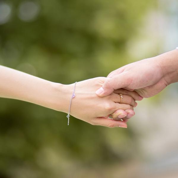 two people holding hands