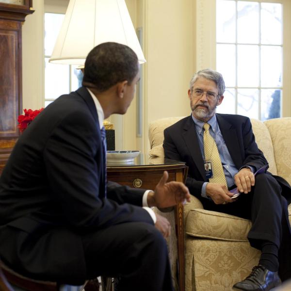 John Holdren speaks with President Obama in the White House