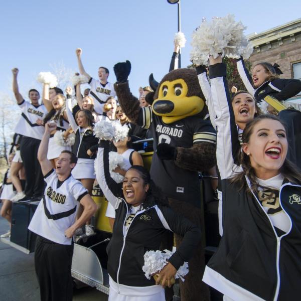 Chip and CU cheerleaders root for the Buffs