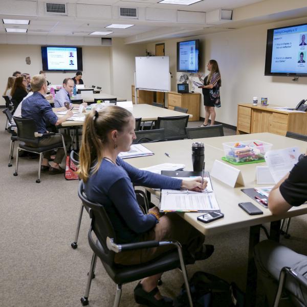 Employees attend an HR workshop
