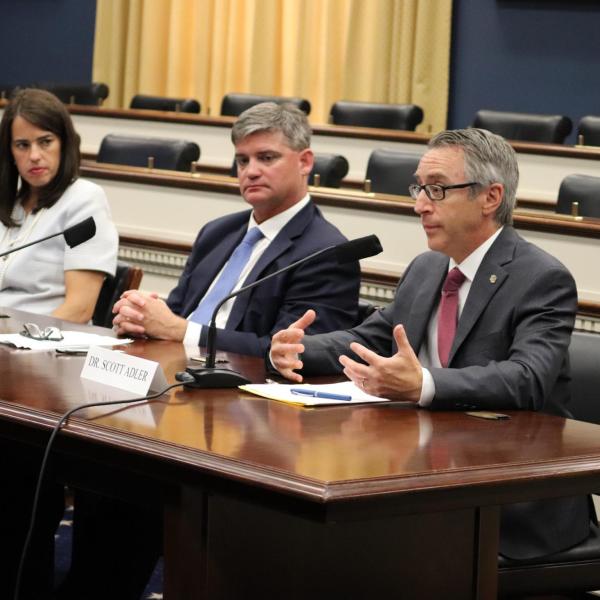 Dean Scott Adler testifying at Congressional hearing