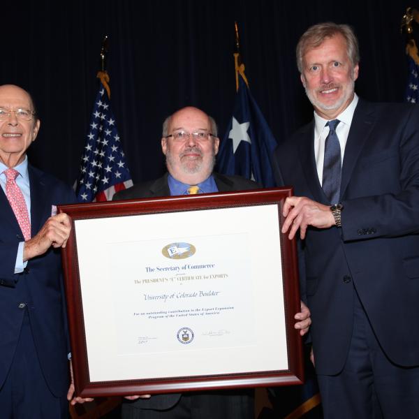 Larry Bell receiving E-AWard in Washington DC
