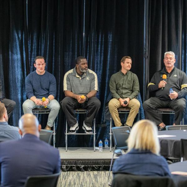 Panelists speak at the Inclusive Sports Summit