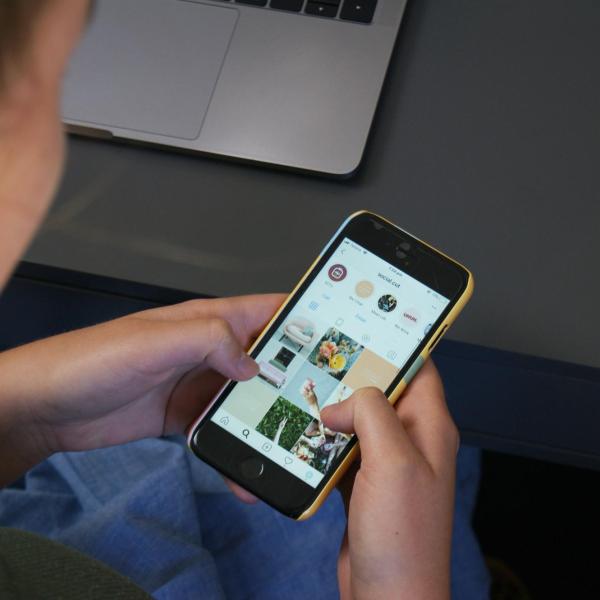 Person scrolling on Instagram
