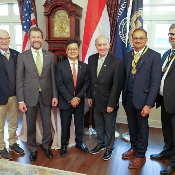 Provost Russ Moore, President Todd Saliman, Tandean Rustandy, Chancellor Phil DiStefano, Dean Vijay Khatri and Jason Thatcher