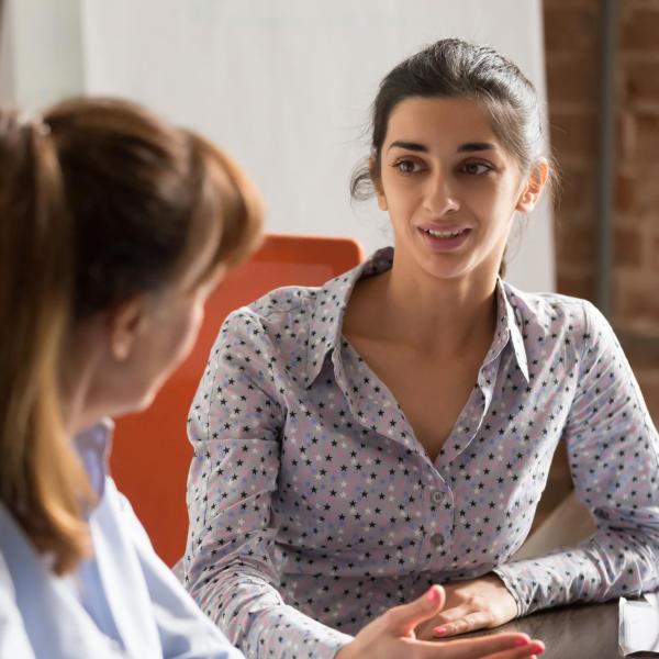 Two people in an interview