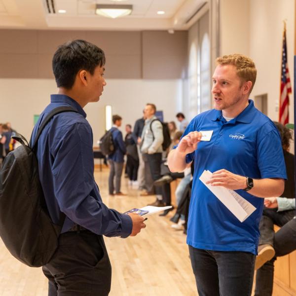 Student and an employer at the Just in Time career fair