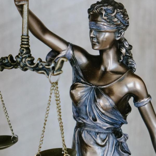 Statue of Justice with scales